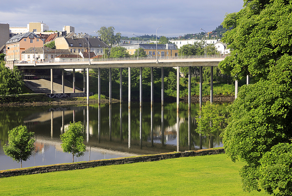 Elgeseter Bridge reflected in water of Nidelva River, Trondheim, Norway, Scandinavia, Europe