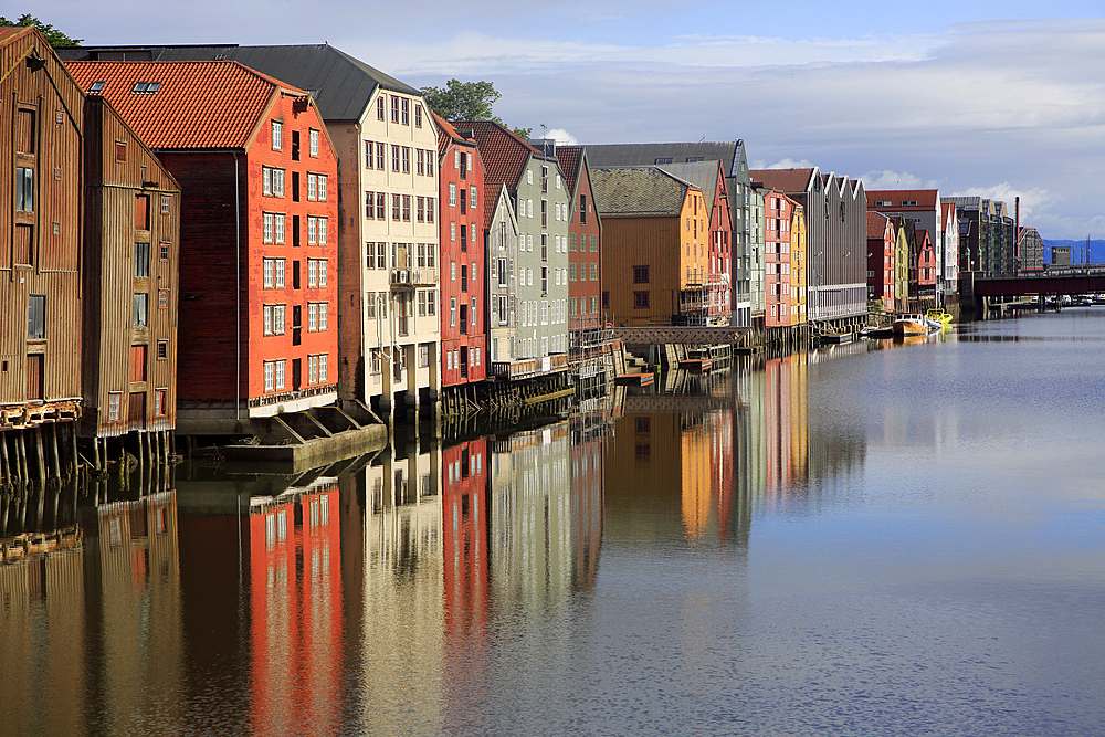 Historic waterside warehouse buildings on River Nidelva, Bryggene, Trondheim, Norway, Scandinavia, Europe