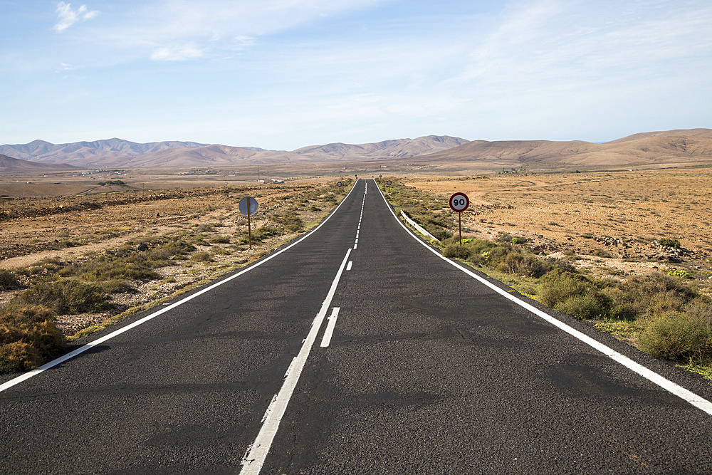 Straight tarmac road crossing desert, Fuerteventura, Canary Islands, Spain, Atlantic, Europe