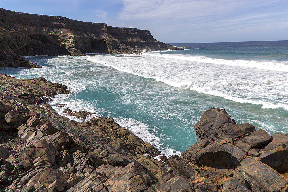 Waves breaking in a small bay near Los Molinos, west coast of Fuerteventura, Canary Islands, Spain, Atlantic, Europe