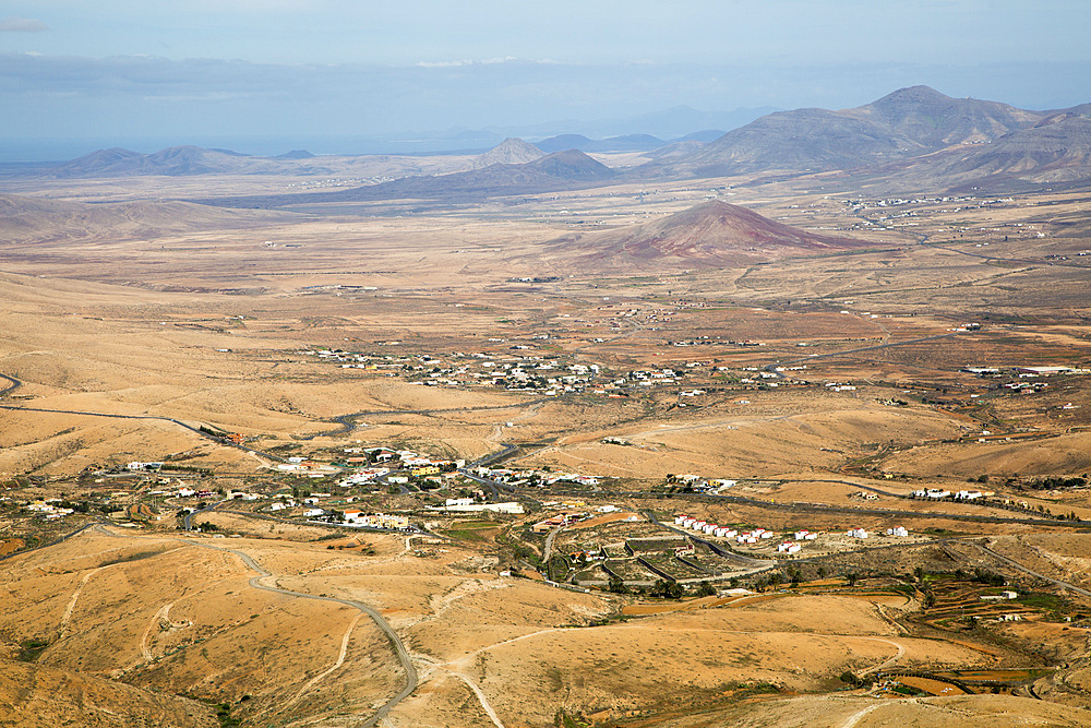 View of land and villages in barren interior of Fuerteventura, Canary Islands, Spain, Atlantic, Europe