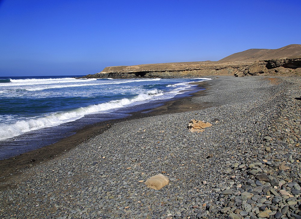 Waves breaking on beach at Playa de Garcey, Fuerteventura, Canary Islands, Spain, Atlantic, Europe