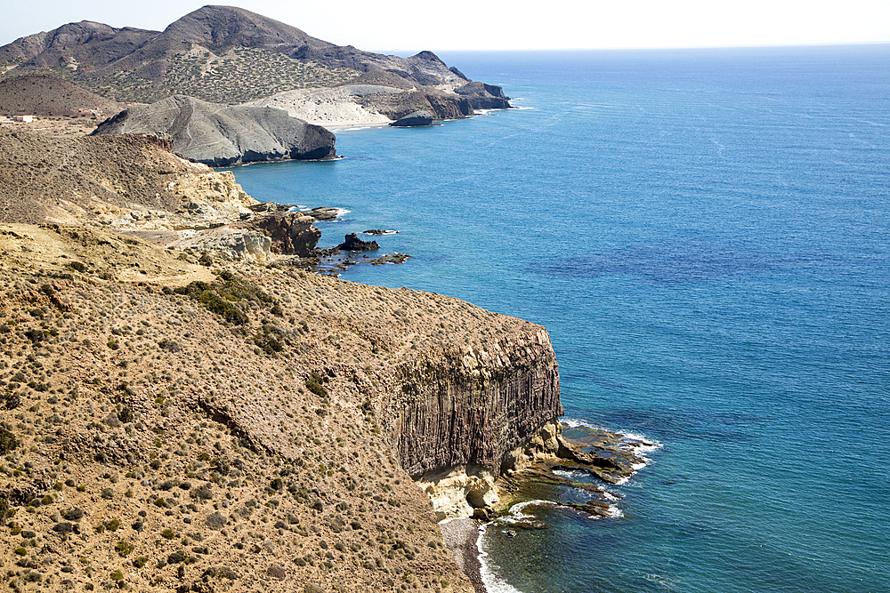 Coastal landscape, Cabo de Gata natural park, looking east towards San Jose, Almeria, Andalusia, Spain, Europe