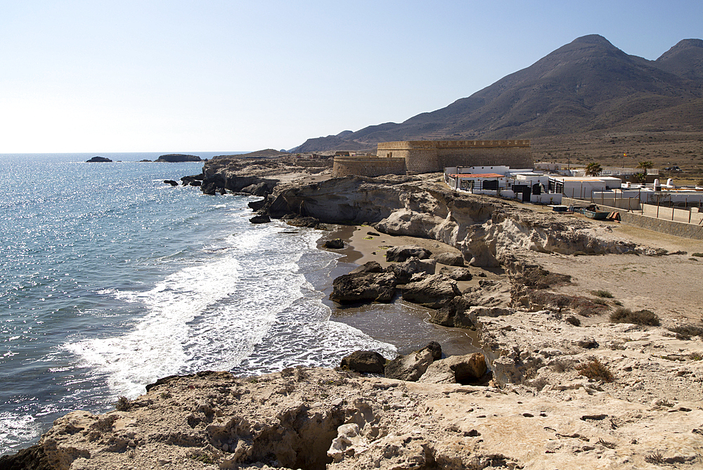 Volcanoes and fossilised sand dune rock structure, Los Escullos, Cabo de Gata natural park, Almeria, Andalusia, Spain, Europe