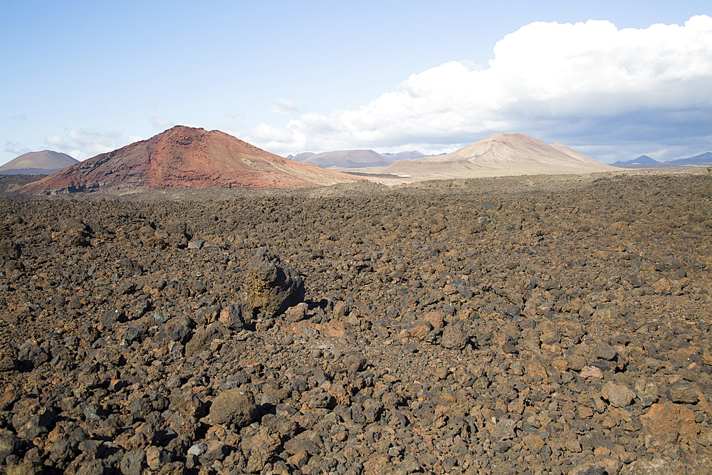 Malpais badlands volcanic landscape looking northeast from Los Hervideros, Parque Natural Los Volcanes, near Yaiza, Lanzarote, Canary islands, Spain, Atlantic, Europe