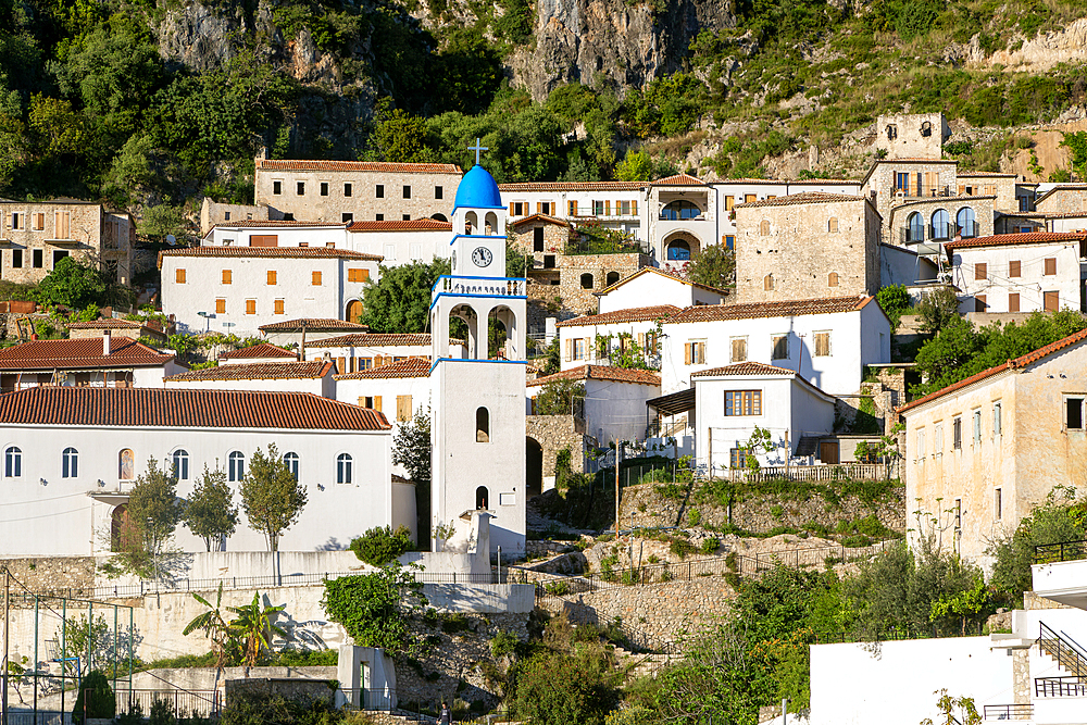 View of whitewashed buildings on mountainside, village of Dhermi, Albania, Europe