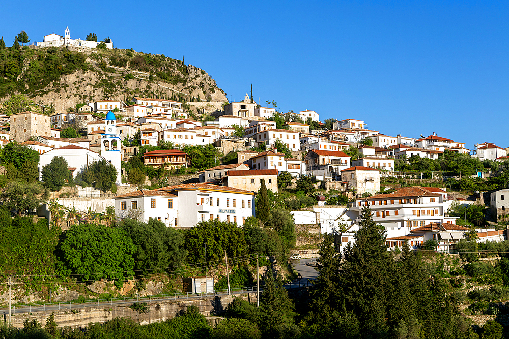 View of whitewashed buildings on mountainside, village of Dhermi, Albania, Europe