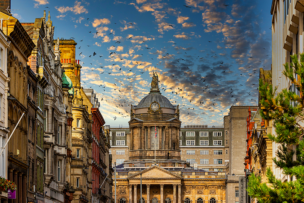 Dramatic sky over historic city street with classic architecture and warm sunlight in Liverpool, Merseyside, England, United Kingdom, Europe