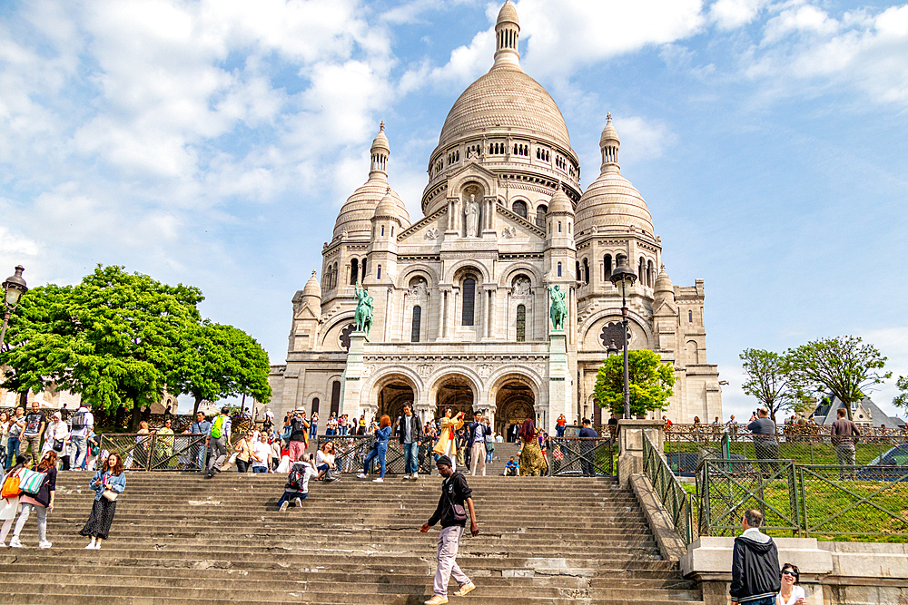 Sacre-Coeur Basilica with tourists on sunny day, Paris, France, Europe