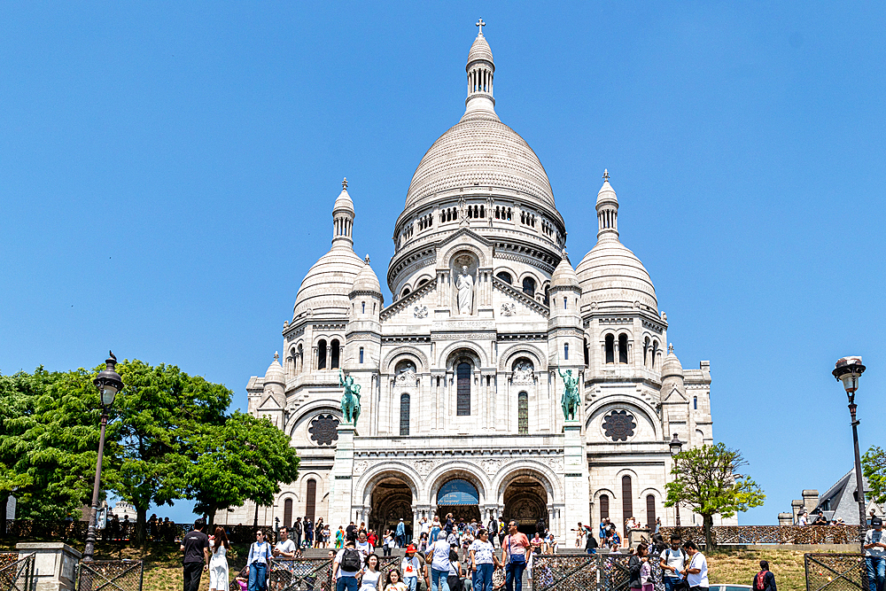 Sacre-Coeur Basilica on a sunny day with tourists, Paris, France, Europe