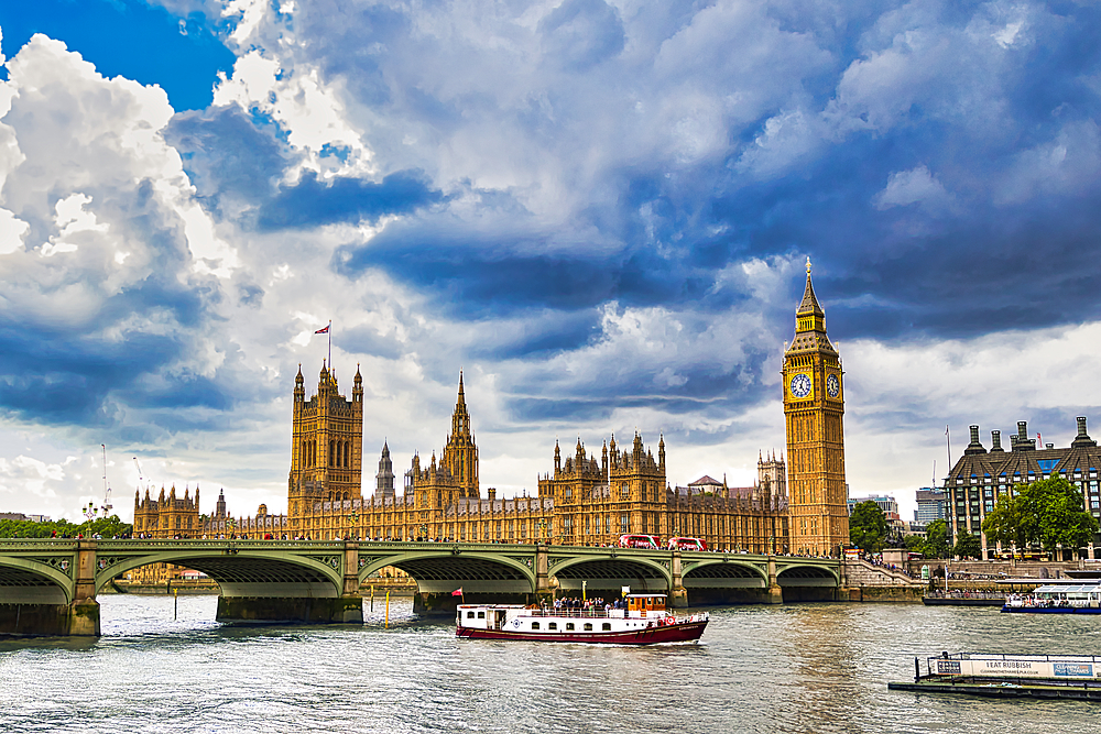 London's iconic Parliament buildings and Big Ben stand prominently along the Thames, with a tour boat passing under Westminster Bridge under a dramatic sky.