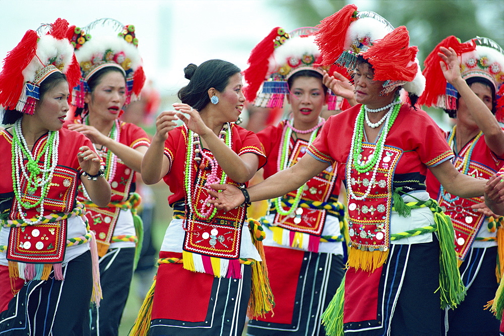 A group of women of the Hwalien tribes in traditional dress during harvest festival, August-September, in Taiwan, Asia