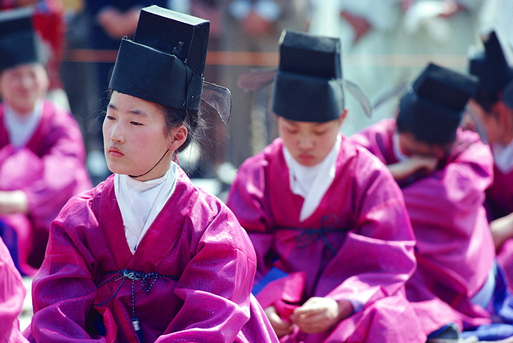 Portrait of people in traditional dress during the Confucian Ceremony at the Chong Hyo Royal Shrine in Seoul, South Korea, Asia