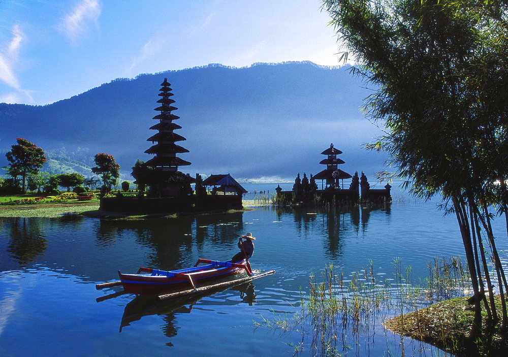 Man in Boat Rowing and Hindu Temples at Lake Bratan, Pura Ulu Danau, Bali