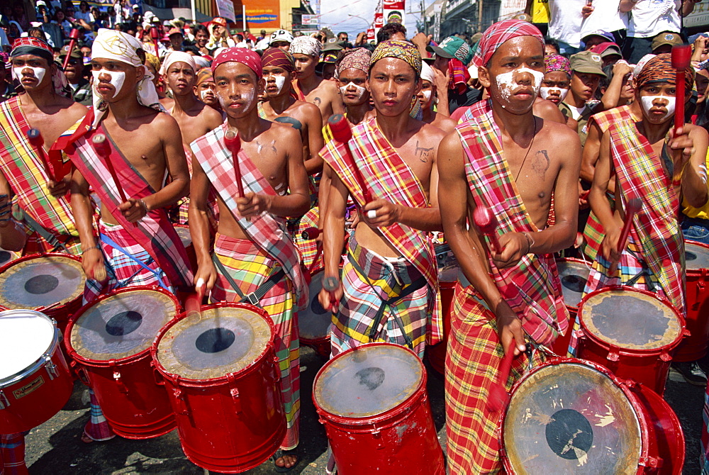 Portrait of a group of drummers during the Mardi Gras carnival, Dinagyant, in Iloilo City, Panay Island, Philippines, Southeast Asia, Asia