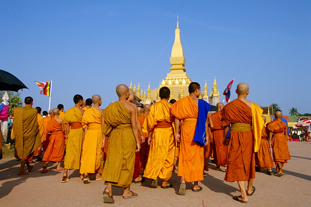 A group of monks at the annual Makka Bu Saa Buddhist celebration, during Pha That Luang (Buddhist Lent), in Vientiane, Laos, Indochina, Southeast Asia, Asia