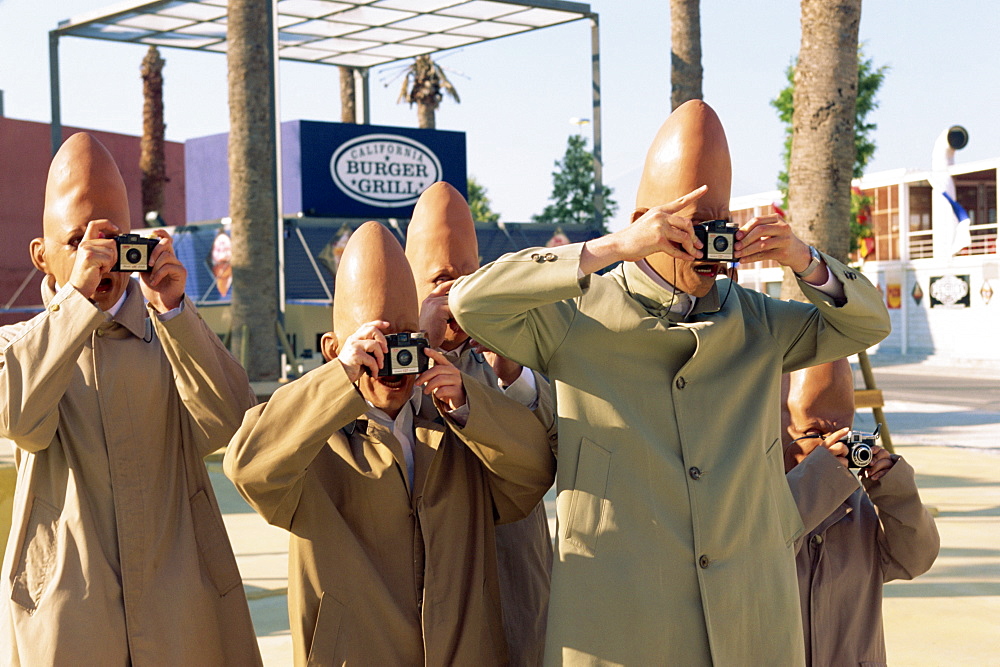 Alien tourists in comedy street show, Expo '98, Lisbon, Portugal, Europe