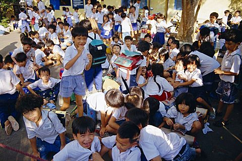 School children at the end of the day at school, Ho Chi Minh City (formerly Saigon), Vietnam, Indochina, Southeast Asia, Asia