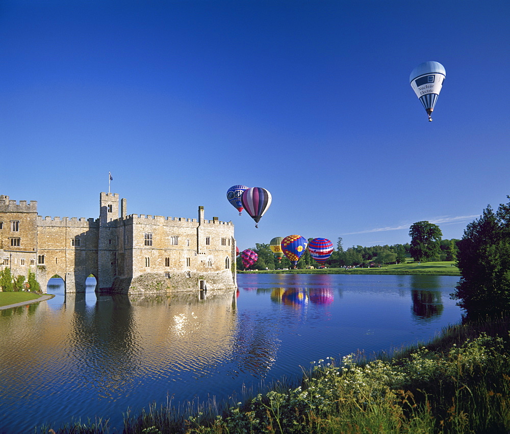 Hot air balloons taking off from Leeds Castle grounds, Kent, England, United Kingdom, Europe