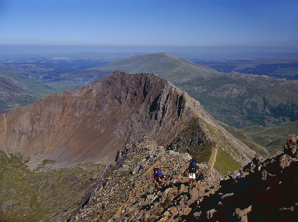 Walkers approaching the summit of Mount Snowdon from the ridge of Y Lliwedd, Snowdonia National Park, North Wales, United Kingdom, Europe