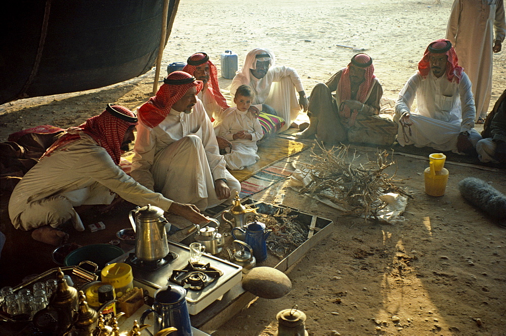 Group of men in Bedouin tent, Saudi Arabia, Middle East