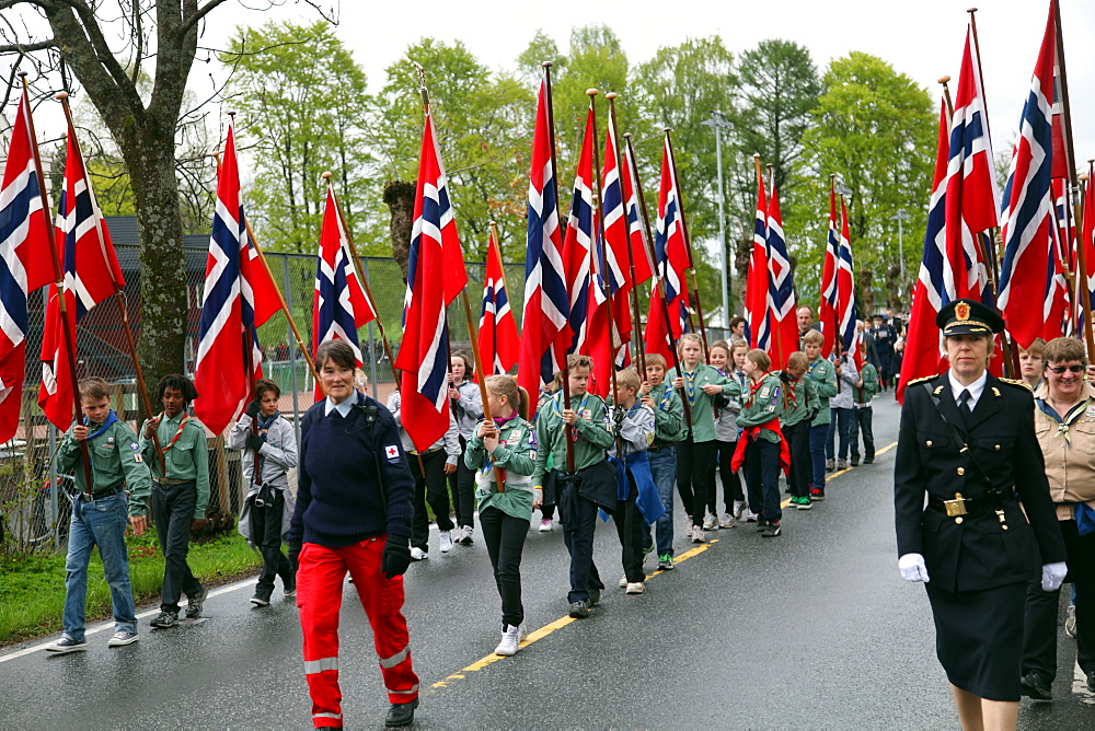 Schoolchildren marching with flags in Asker near Oslo on 17 May, the Norwegian National Day, Norway, Scandinavia, Europe