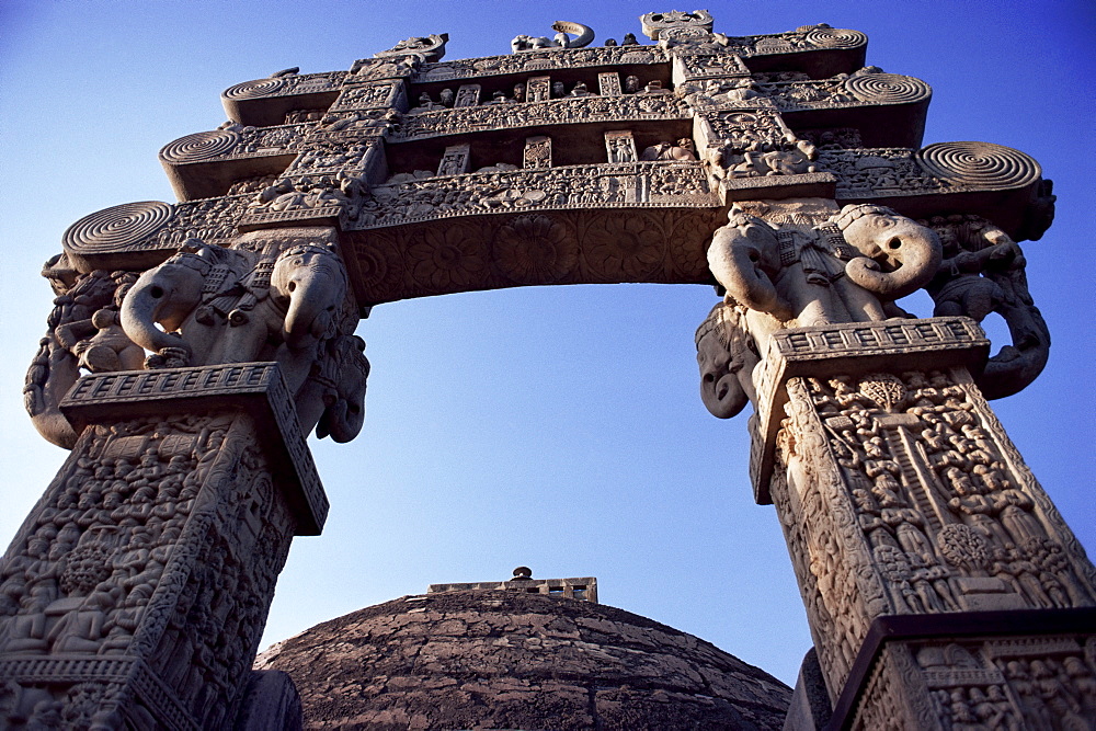 One of the four carved stone toranas (gateways), Stupa One, Buddhist shrine dating from 3rd century BC, Sanchi, UNESCO World Heritage Site, Madhya Pradesh state, India, Asia