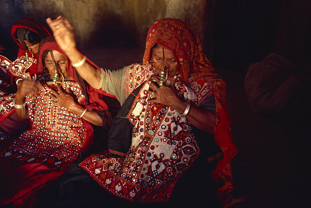 Muslim Jat tribes with gold nose rings, famous for embroidery work, Kutch district, Gujarat state, India, Asia