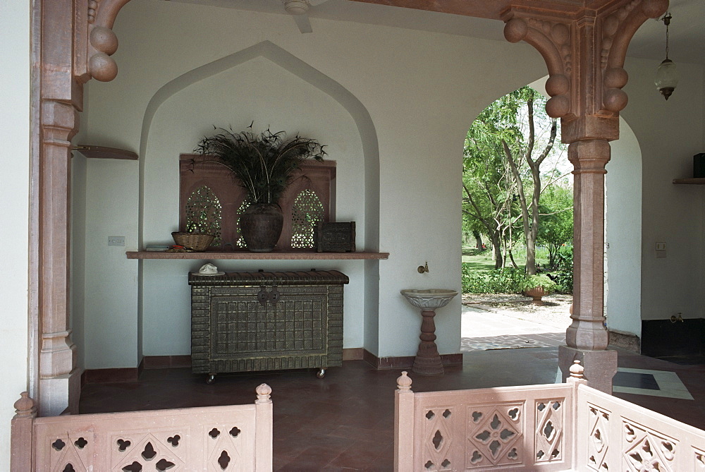 Old architectural stone salvage has been incorporated into the structure of new build home, near Jaipur, Rajasthan state, India, Asia