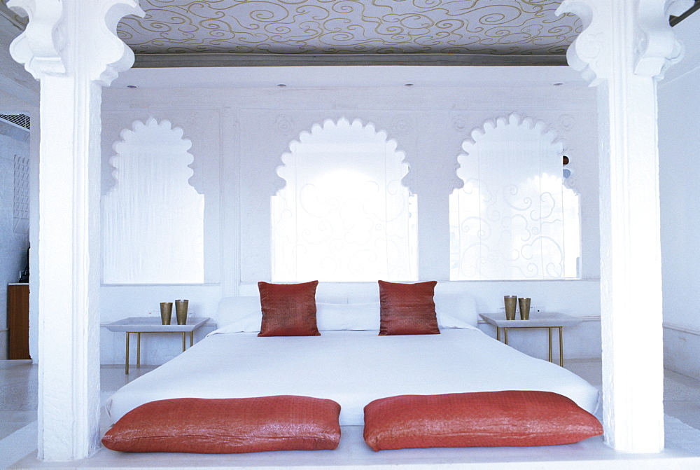 Bedroom suite with traditional cusped arches, Devi Garh Fort Palace Hotel, near Udaipur, Rajasthan state, India, Asia