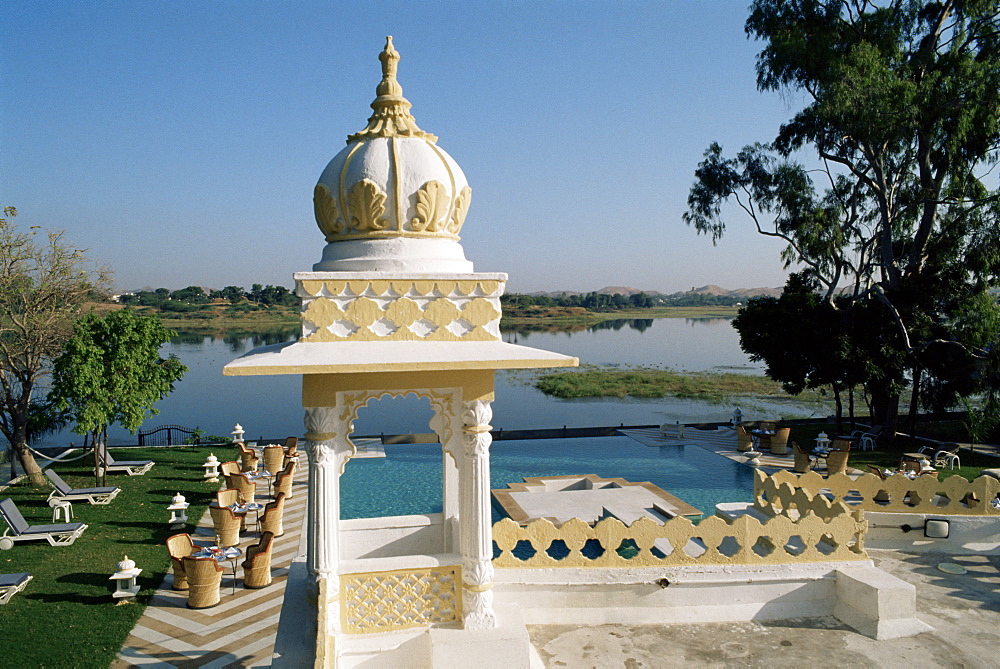 The swimming pool overlooking the lake at Dungarpur, Udai Bilas Palace, Dungarpur, Rajasthan state, India, Asia 