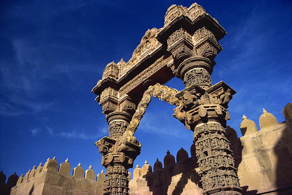 Torana (arched gateway) of the walled Jain temples at Lodrapur, Rajasthan state, India, Asia