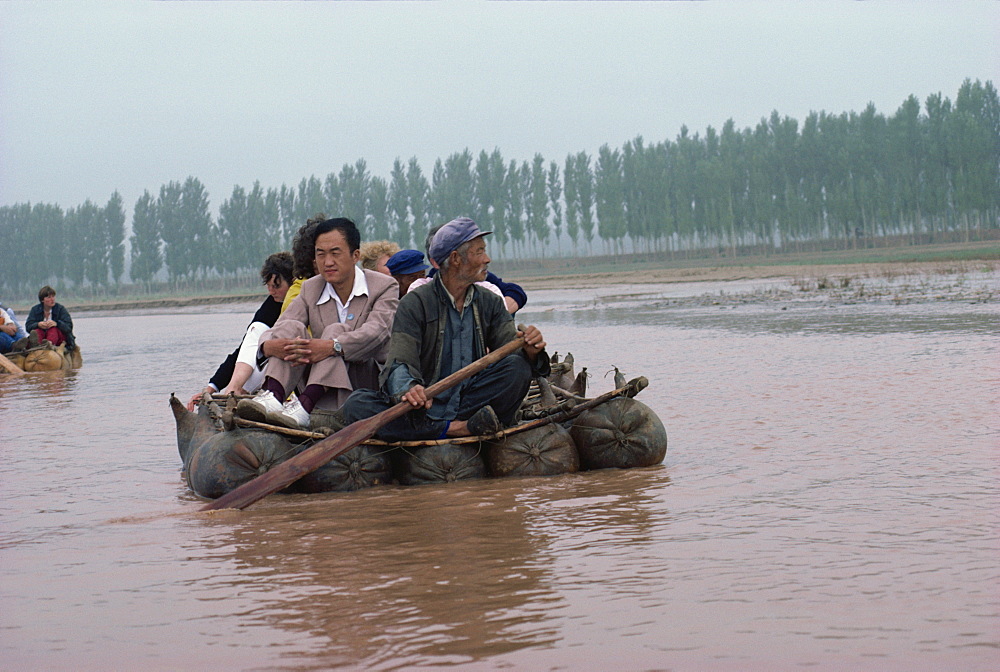 Pigskin rafts floating down the Yellow River, Ningxia Province, China, Asia