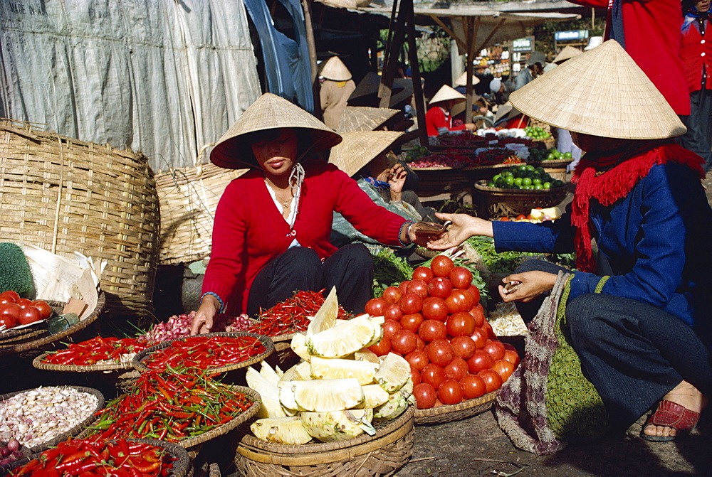 Vegetables and pineapples on sale in free market in southern Vietnam, Indochina, Southeast Asia, Asia