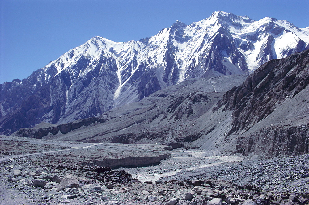 The Karakorum (Karakoram) Highway on the Chinese side, with River Giz, Xinjiang, China, Asia