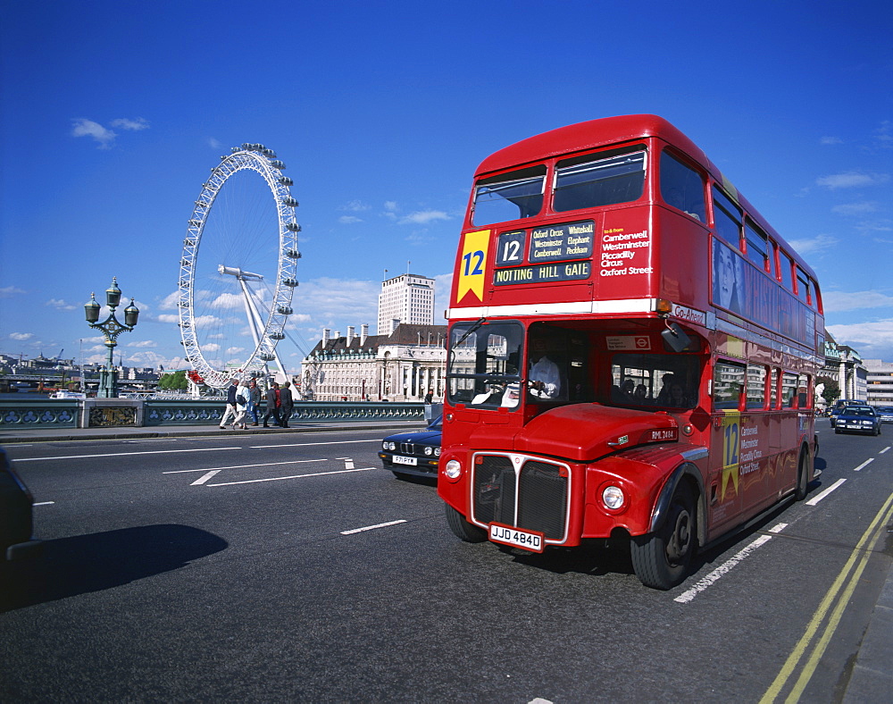 Old Routemaster bus before they were withdrawn, on Wesminster Bridge with London Eye in background, London, England, United Kingdom, Europe