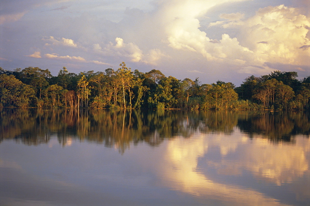 Clouds reflected in the Sepik River, Papua New Guinea, Pacific