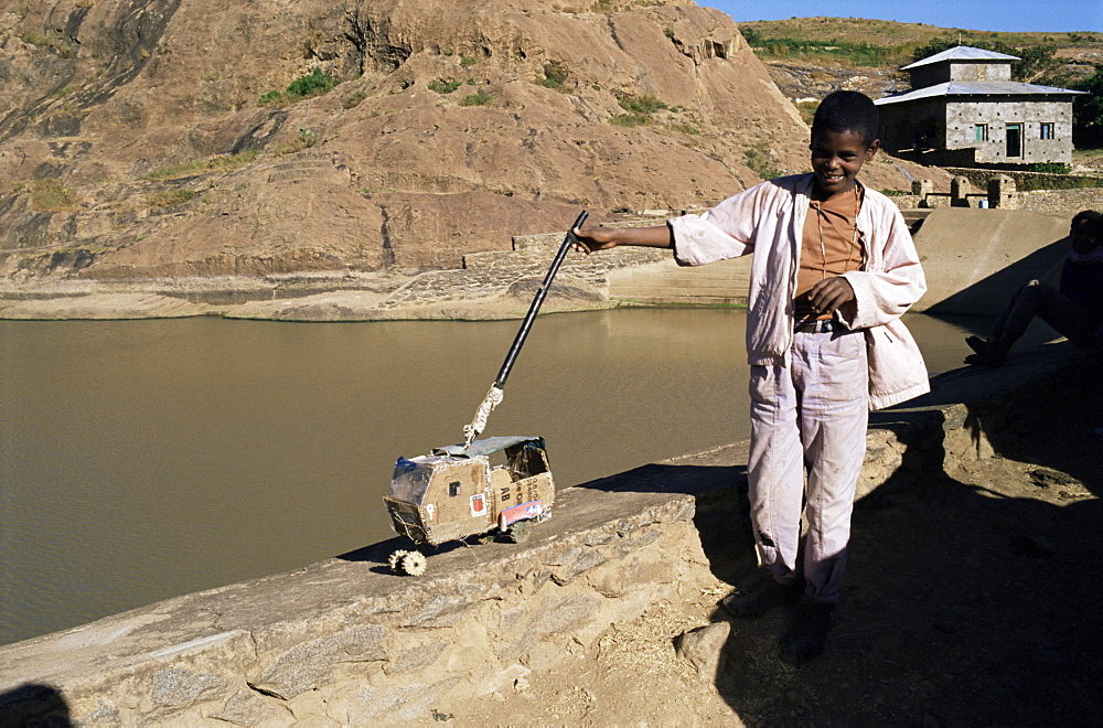 Child and toy, Axum, Ethiopia, Africa