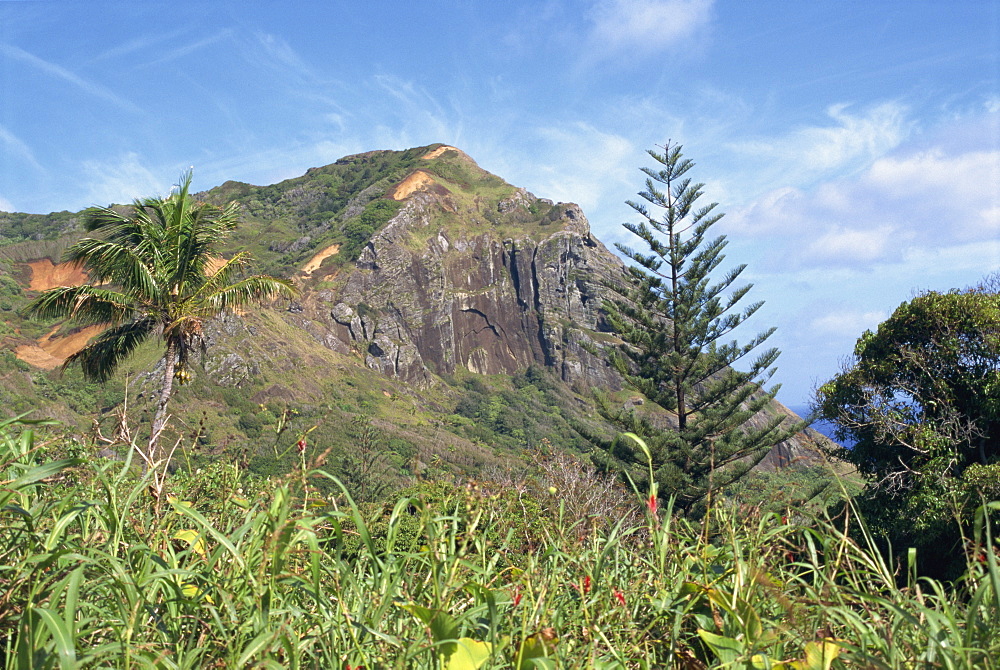 Landscape of rocky hills and vegetation on Pitcairn Island, Pacific