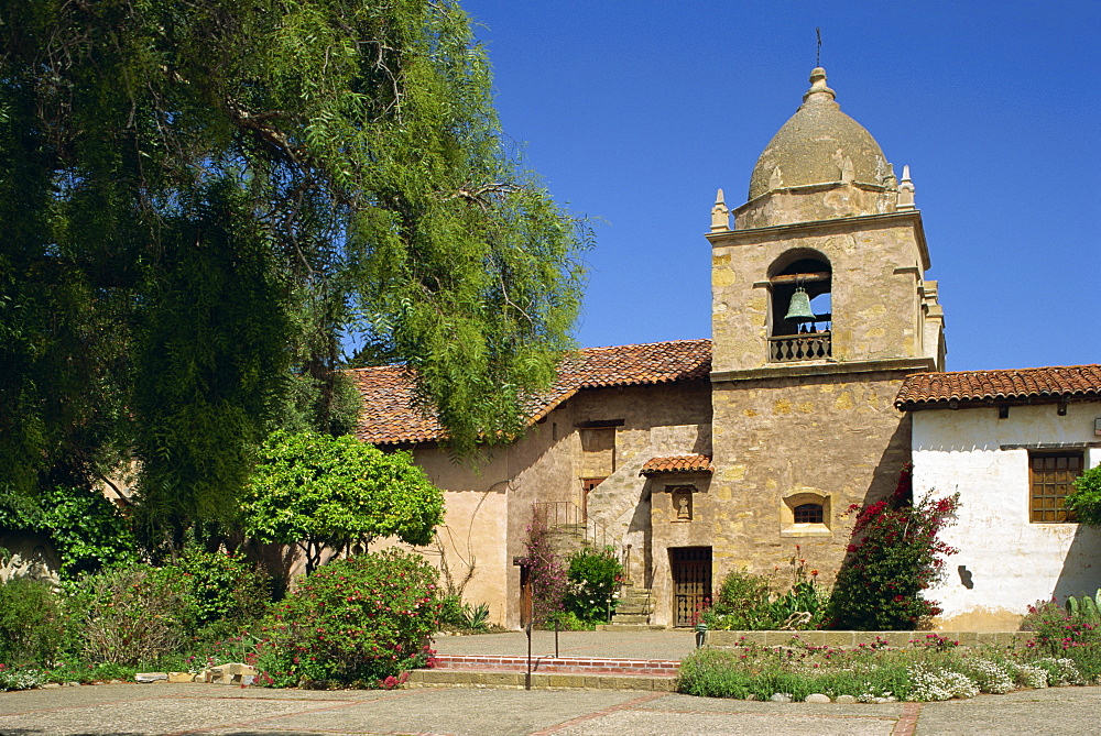 Basilica and bell tower at Carmel Mission, founded 1770, by Junipero Serra at Carmel by the Sea, California, United States of America, North America