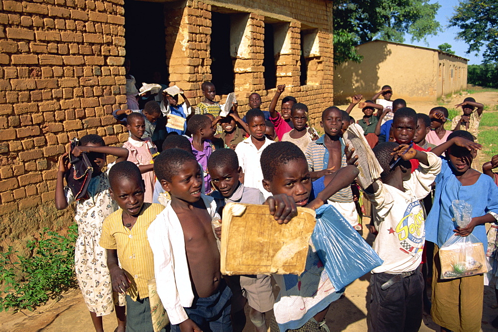 A group of children leaving the village school at Kande near Lake Malawi, Malawi, Africa