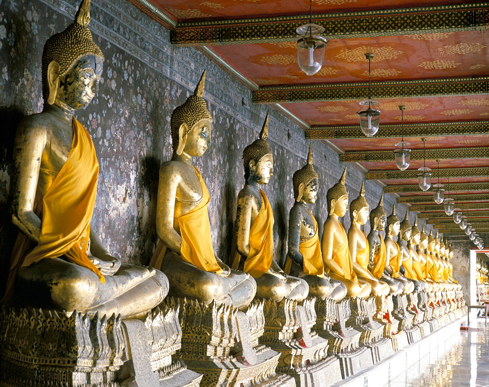 Seated Buddha images, Wat Suthat, Bangkok, Thailand, Southeast Asia, Asia