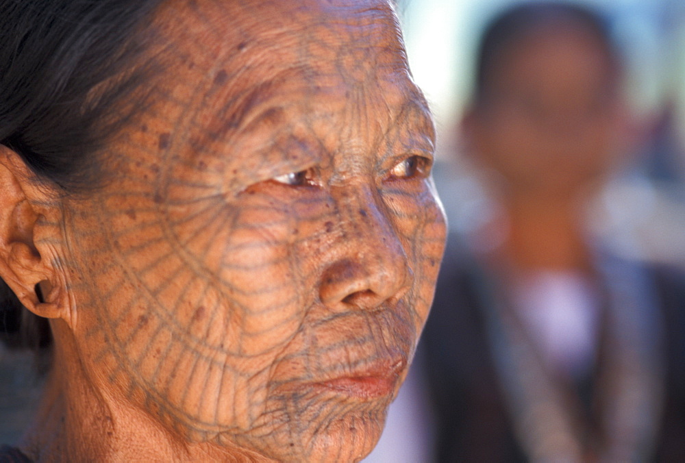 Chin woman with spiderweb tattoo, Chin state, Myanmar (Burma), Asia
