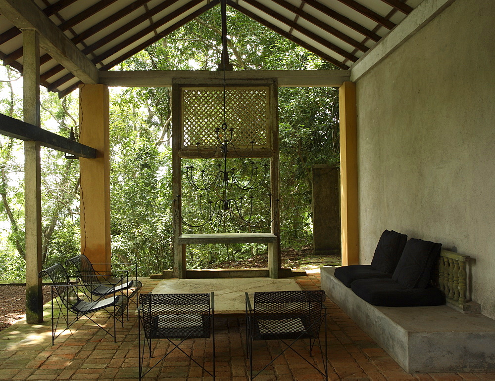 Verandah of the guesthouse at Lunuganga Garden Estate, garden developed by Geoffrey Bawa who lived between 1919 and 2003, Bentota, Sri Lanka, Asia