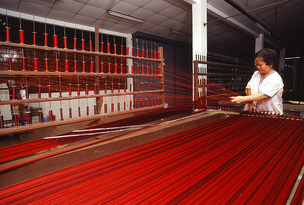 Stretching Silk at Jim Thomson Factory in Korat, Thailand, Southeast Asia, Asia