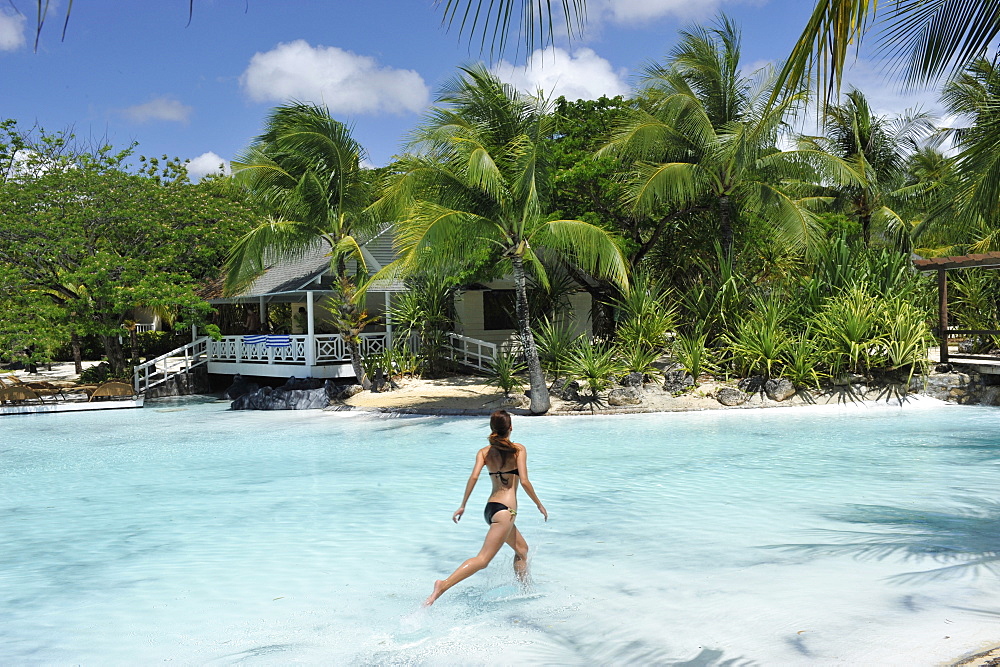 Girl at the pool at Plantation Bay Resort in Cebu, Philippines, Southeast Asia, Asia
