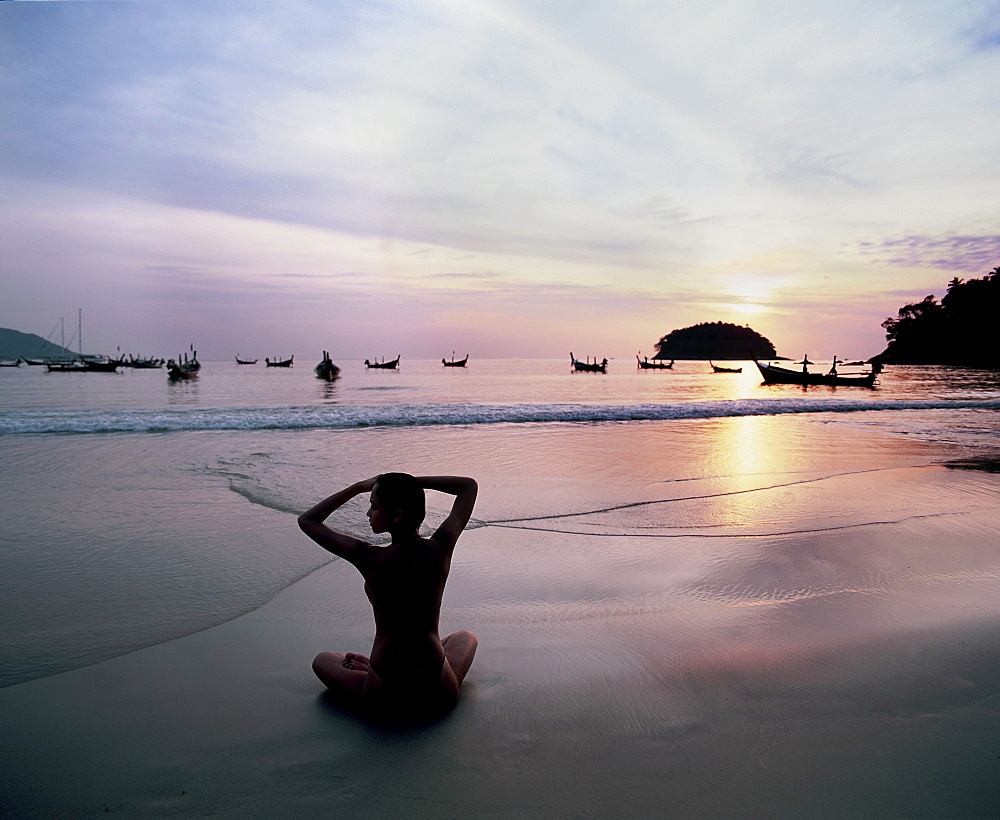 Girl doing yoga on Kata Beach, Puket, Thailand, Southeast Asia, Asia