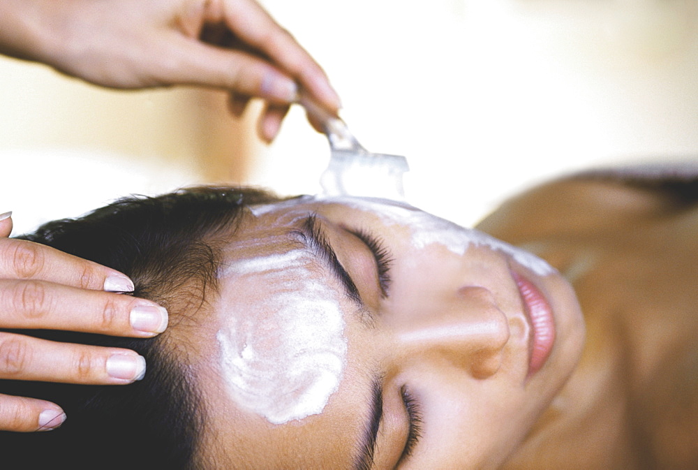 Woman having a facial, Kirana Spa, Indonesia, Southeast Asia, Asia