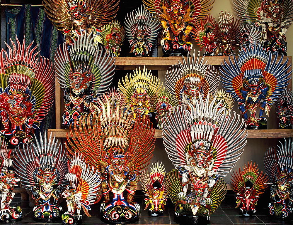 Carved and brightly-painted Garudas at a souvenir shop in Bali, Indonesia, Southeast Asia, Asia