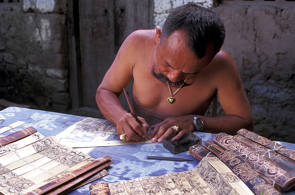 Man writing lontar manuscripts, Bali, Indonesia, Southeast Asia, Asia